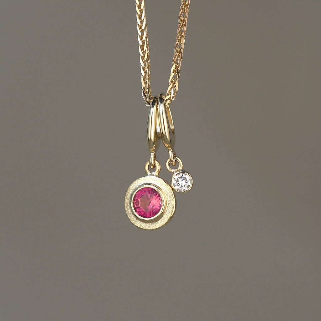 gold and ruby charm, handmade in Dublin